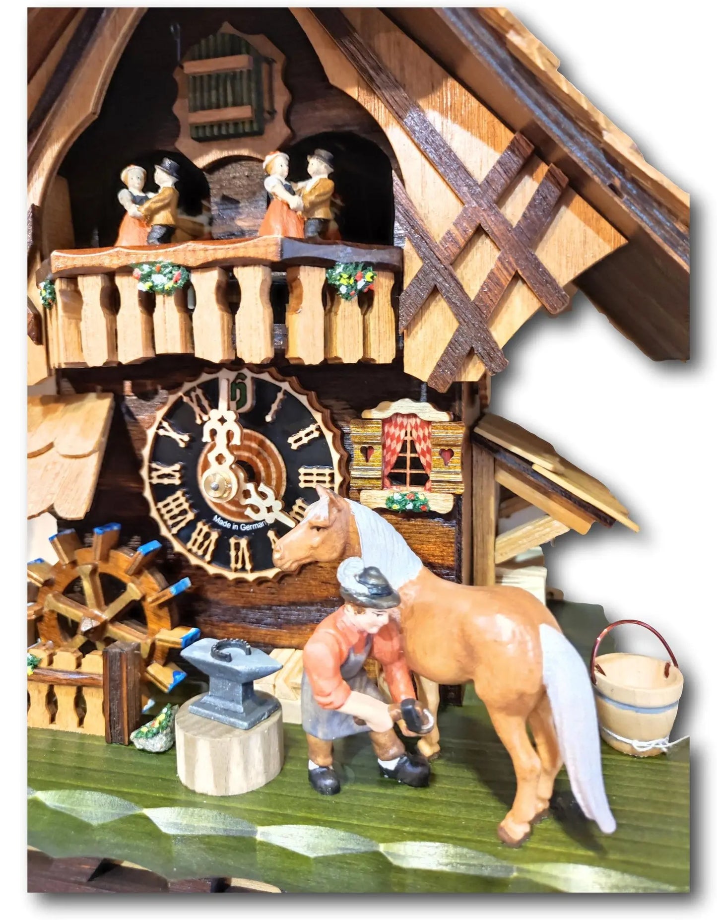 Blacksmith with Black Forest house 1 day Cuckoo clock with music Hoenes