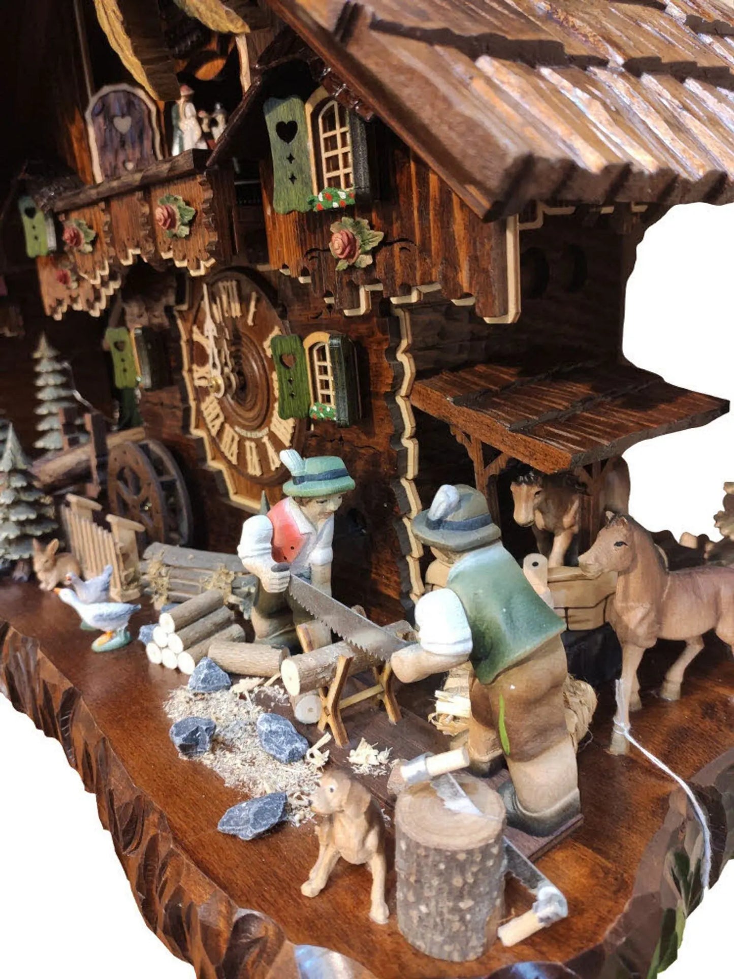 Wooden sawyer with dancers 8 days Cuckoo clock with music - Montag Steins & Clocks