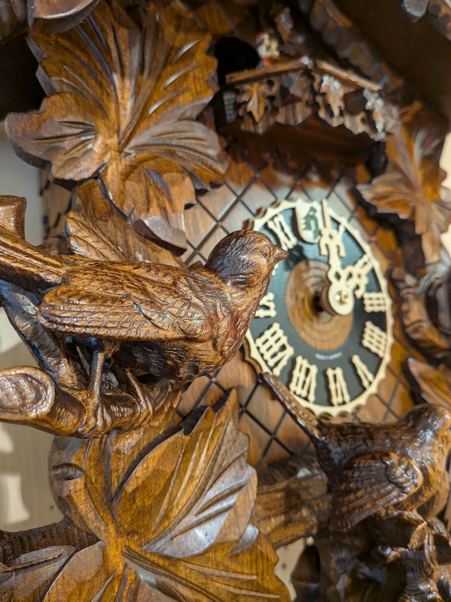Black Forest Carved Cuckoo Clock – 8 Day Movement – Music & Dancers – 7 Leaves Hoenes