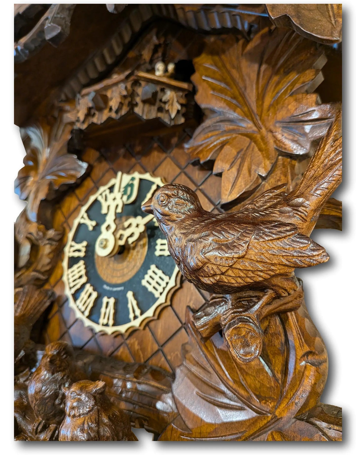 Black Forest Carved Cuckoo Clock – 8 Day Movement – Music & Dancers – 7 Leaves Hoenes