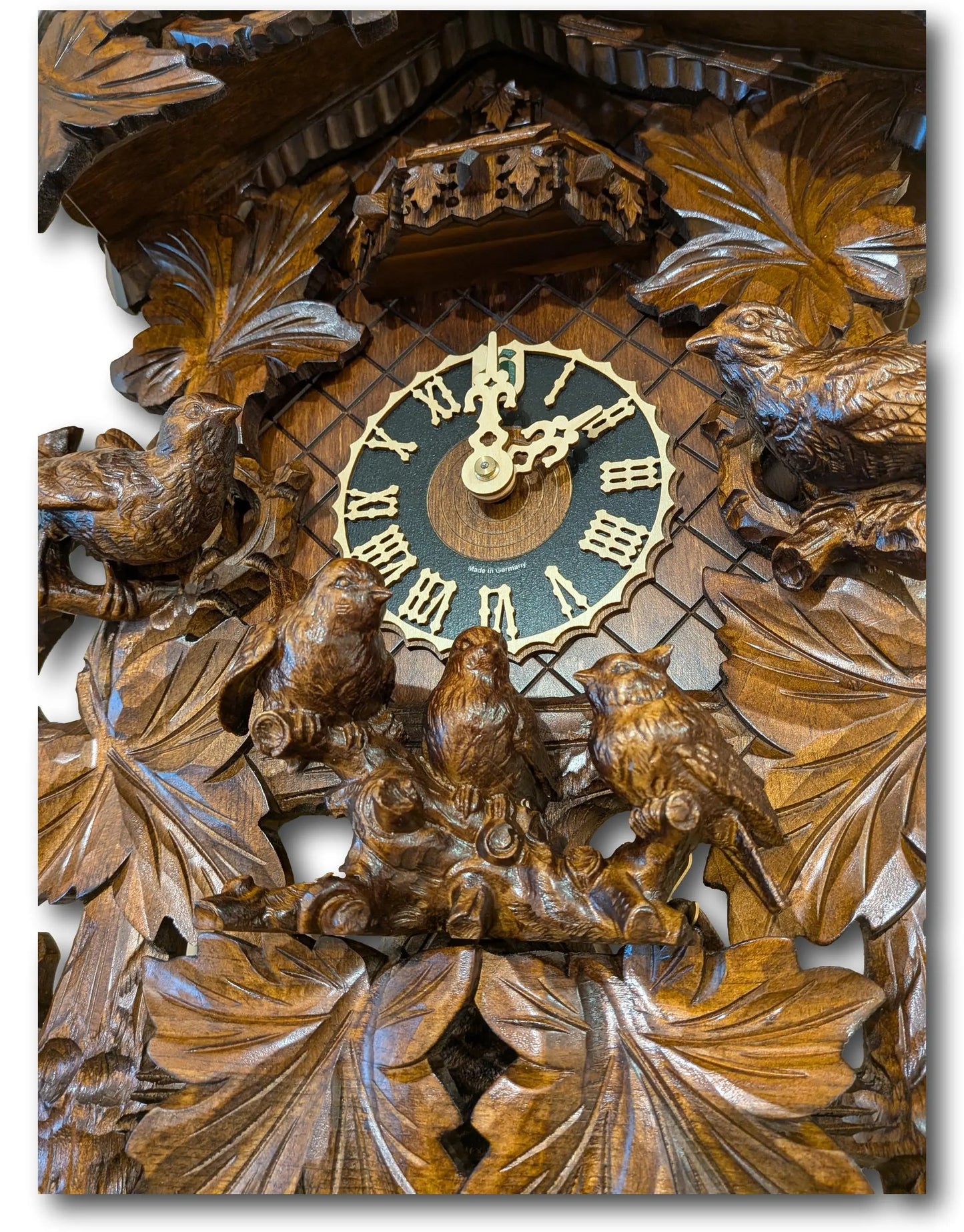 Black Forest Carved Cuckoo Clock – 8 Day Movement – Music & Dancers – 7 Leaves Hoenes