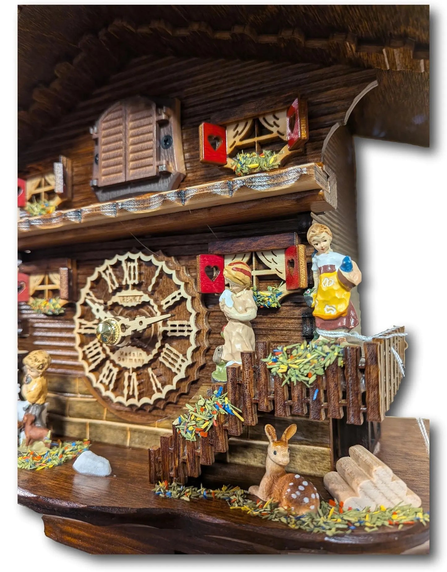 Black Forest Cuckoo Clock – Children with Deer – Quartz Movement – 12 Melodies – Light Sensor Night Shut-Off – Trenkle Uhren – Made in Germany Trenkle