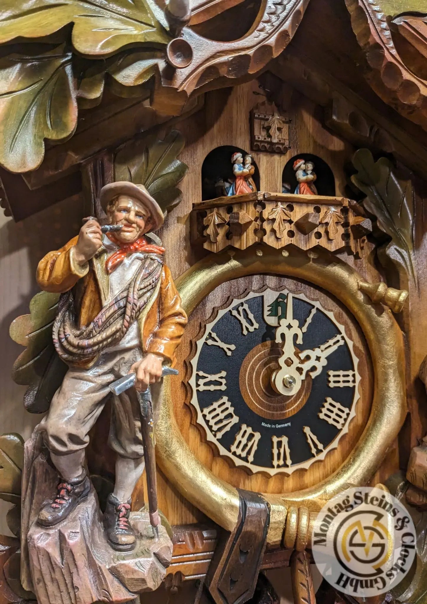 Climber with eagle colorful 8 day cuckoo clock with music Hoenes