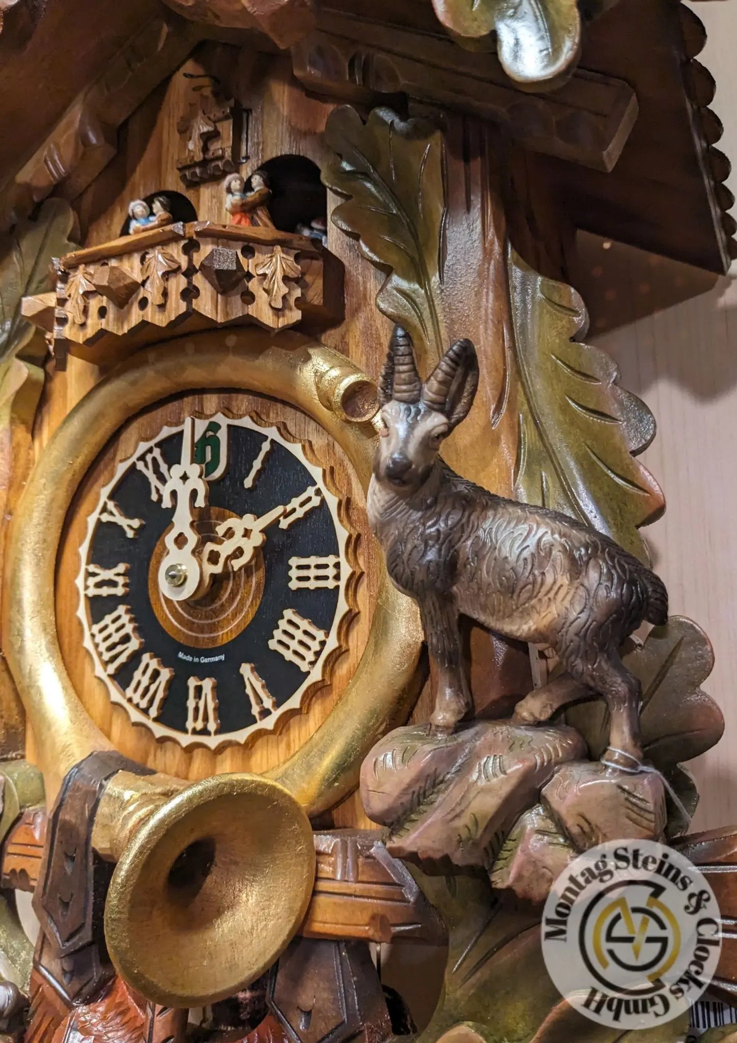 Climber with eagle colorful 8 day cuckoo clock with music Hoenes