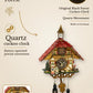 Quartz cuckoo clock with 2 seated figures and bell tower | Montag Steins & Clocks