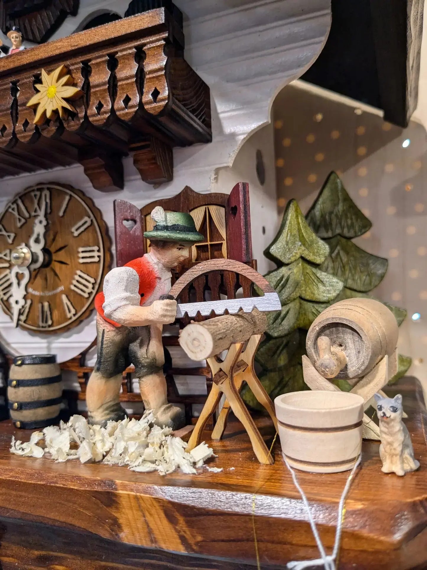Woodchopper with Cat 1 Day Clock Hekas
